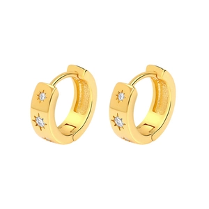Elegant gold hoop earrings with starburst zircon accents on a clean white background