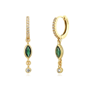 Close-up of gold dangle earrings with marquise-cut green gemstones and Ag925 silver stamp