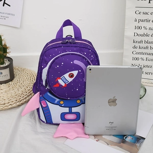 Purple toddler rocket backpack compared with an iPad for size reference and scale