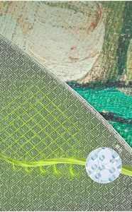 Detail of eco-friendly non-slip silicone backing on vintage round rug with cotton linen texture