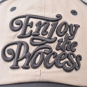 Washed cotton baseball cap featuring high-quality 3D embroidered lettering ENJOY the Process