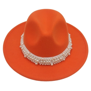 Detailed view of an orange wool fedora hat featuring a stylish pearl beaded hat band