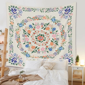 Detailed view of bohemian mandala tapestry featuring colorful floral patterns in a bedroom