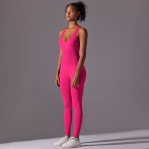 Detail of the racerback design on a hot pink seamless yoga bodysuit with high stretch