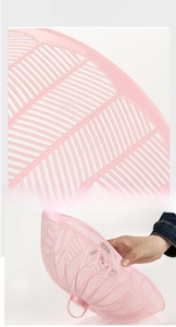 Pink PP mesh food cover showing smooth edges and flexible, foldable plastic material