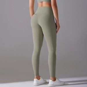 Close-up of V-shaped peach butt stitching on sage green high-waist yoga pants