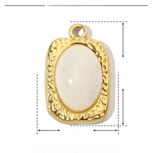 Detail view of oval natural stone pendant with dimensions 22mm x 14mm in gold stainless steel