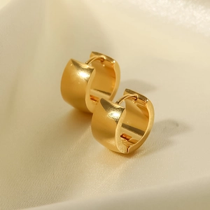 Minimalist 18K gold plated stainless steel chunky hoop earrings on white silk