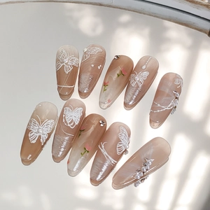 Stickers ongles papillon mats dégradé crème avec perles et strass brillants