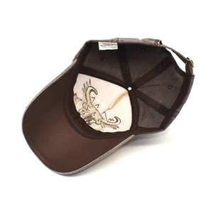 Detail view of 100% cotton inner lining and stitching of the washed baseball cap