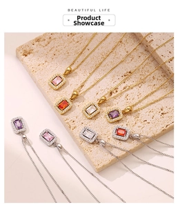 Detail showing rectangular colored gemstone necklaces with crystal halo in gold and silver