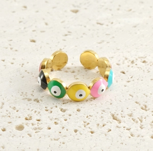 Close-up of 18K gold stainless steel evil eye ring with colorful enamel detailing