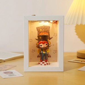 Desktop hollow frame display box with warm LED lighting and miniature character figure