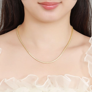 Elegant 2mm moissanite tennis necklace in gold plating on sterling silver for women