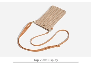Detailed top view of herringbone woven straw crossbody phone bag with adjustable strap