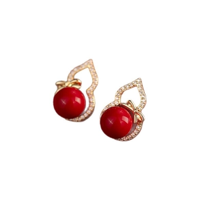 Zircon gourd stud earrings with red beads and golden bow detail on white background