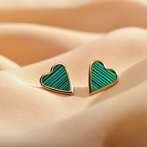 Elegant heart-shaped stud earrings featuring green malachite texture with gold edging