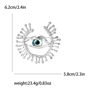 Silver evil eye brooch with rhinestones showing dimensions 6.2cm and weight 23.4g