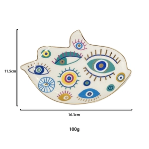 Detailed view of Hamsa ceramic tray showing 16.3cm width and 11.5cm height dimensions