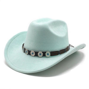 Detailed view of pale mint green faux suede jazz hat with ethnic leather band and blue gems