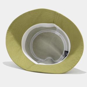 Outdoor butterfly embroidered bucket hat in grass green with high-quality white lining