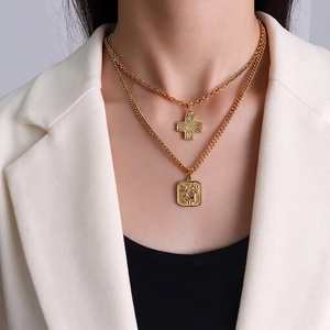 Layered 18k gold plated necklace with cross pendant and embossed rose square medal