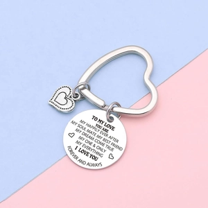 Polished stainless steel heart keychain with romantic engraved message for couples