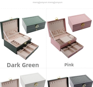 Detailed internal compartments of double-layer faux leather jewelry box with lock