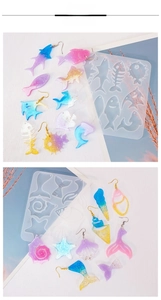 Detail of ocean-themed silicone molds with glitter resin earrings in dolphin and shell shapes