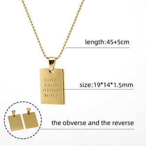 Detailed view of square military tag necklace with Love Each Other More engraving