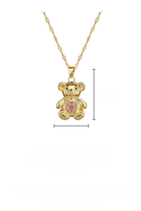 Detail of bear pendant with pink heart gemstone and gold titanium steel chain