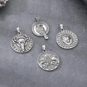 Collection of Nordic Viking pendants featuring wolf and eagle relief in antique silver