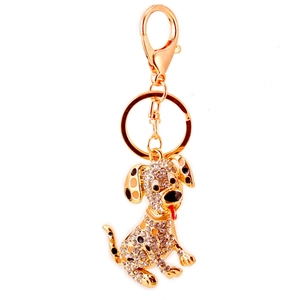 Llavero de dálmata con diamantes de imitación en dorado y detalles de esmalte negro