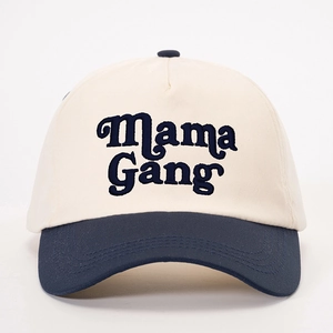 Two-tone baseball cap with Navy blue brim and Mama Gang embroidery on cream crown