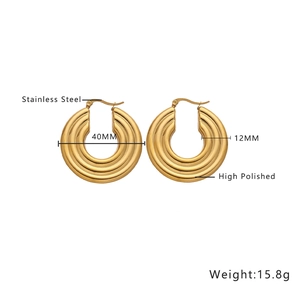 Macro view of 40mm stainless steel C-shape earrings with triple layer design and gold finish