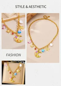 Detail of gold chain necklace with celestial charms including moon, stars, and pearls