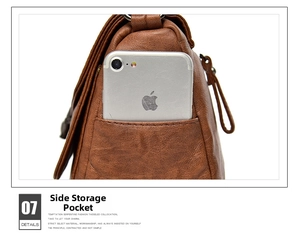 Detail view of the brown retro bag side pocket showing smartphone storage capacity