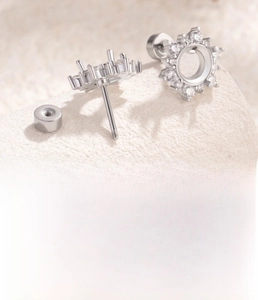 Macro detail of 6mm snowflake titanium steel ear stud setting for DIY jewelry making