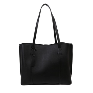 Classic black faux leather tote bag with large capacity and double straps on white background