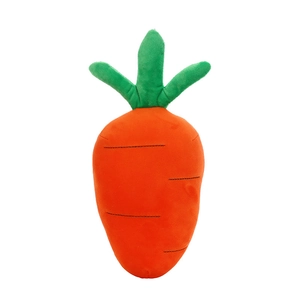 Cute carrot plush toy made of soft orange fabric with green leaves for gift decoration