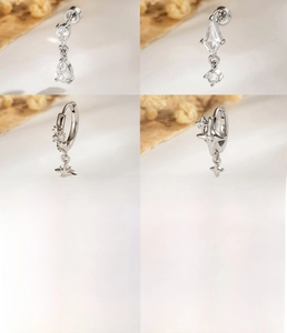 Detail of silver starburst ear studs with 0.8mm gauge screw backs and white zircon stones