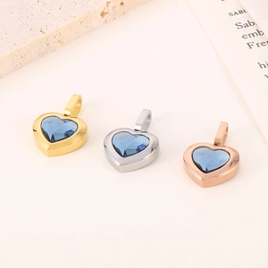 Luxurious heart pendants in gold, silver, and rose gold with blue crystals for women