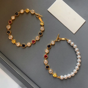 Bracelet élégant en or 18 carats avec zircon cœur et perles, fermoir à bascule vintage
