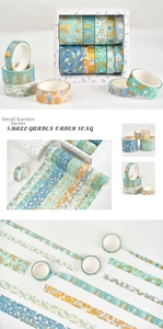 Close-up of Washi tape set featuring floral patterns and garden theme for DIY journaling