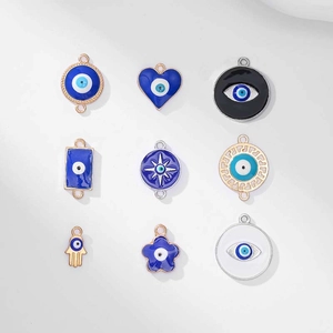 Set of Turkish evil eye jewelry pendants including Hamsa Hand and heart shapes