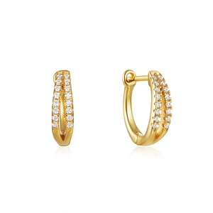 Detailed close-up of golden double-row pavé huggie hoop earrings with sparkling cubic zirconia