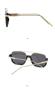 Detail view of gold metal double bridge sunglasses showing side and back structure