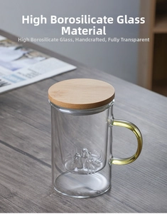 Detail of high borosilicate glass cup with wooden lid and 3D mountain base design