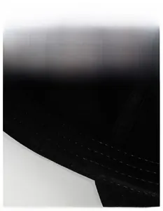 Detail view of the wide moisture-wicking sweatband and reinforced stitching inside the cap