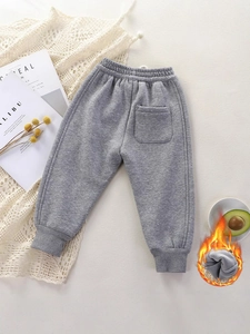 Warm fleece-lined grey children's sweatpants with elastic waist and back pocket